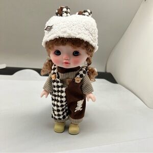 Charming Doll with Green Overalls and Cap